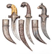 A group of three jambiyas:,