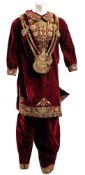 An early 20th century Indian velvet and gilt braided kutra and matching trousers:,