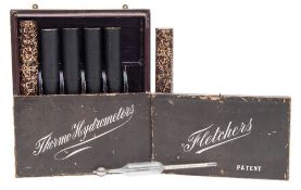 A cased set of Fletcher 'Thermo Hydrometers',