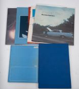 A collection of Rock and Pop autographs in two albums including The Ramonnes:, ACDC, Uriah Heep,