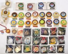 A collection of enamel badges comprising twenty four Surrey Agricultural Show badges 1967-1990 ,