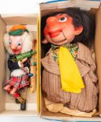 A boxed Pelham Puppet 'Sandy MacBoozle':, together with a boxed Pelham Ventriloquial puppet 'Boy'.