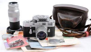 A Leica M3 camera:, serial number 1089393, with black crackle body and chrome plated mounts,