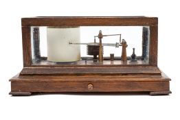 An oak cased barograph by Negretti & Zambra, London:, numbered 'R/5644',