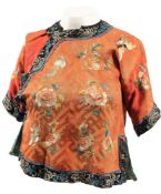 A Chinese blue silk floral embroidered jacket:,