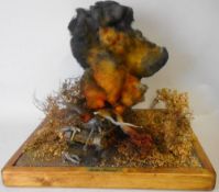 A 1/35th diorama of a World War II exploding tank: entitled 