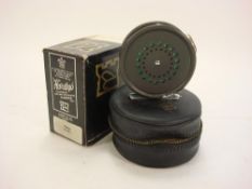 A Hardy Perfect 3 3/8 inch fly reel:, black handle, agate line guide and engine turned tensioner,