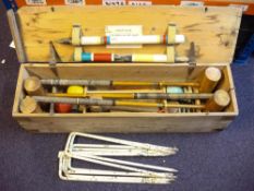 A pine cased croquet set by F Hayres, London:.