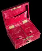 A late 19th/early 20th century red leather money box:,