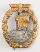 A reproduction German WWII Kriegsmarine Auxillary Cruiser badge in the manner of JMME:.
