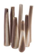 *Val Barry (1937-2018) seven porcelain 'chimney' vases: of thrown and squashed tapering form under