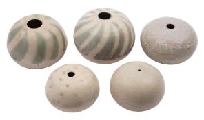 *Val Barry (1937-2018) five stoneware 'compressed spheres': two decorated with wax resist radial