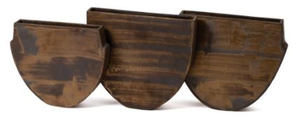 *Val Barry (1937-2018) three stoneware 'flattened bowls': of narrow profile on demi-lune bases,