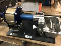 Microfluidics Microfluidizer Model: 110L, Serial: 2004135. Internaction Chamber: G10Z. As shown in