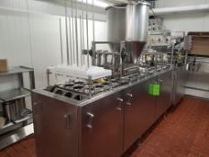 Filler ATS Engineering INC; 12 ounces cup (Located in Dixon, Illinois)(Not Available for Removal