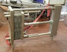 APV 35”H x 10”W S/S Plate Press, S/N 19512, with (40) Plates ***REMOVAL DELAYED UNTIL 8/1/2019 -