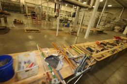 Contents of Table Tops, Includes Gardening Hoes, Spare Saw Blades, Brushes, Extentsion Cords, Bungie