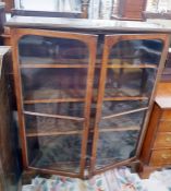 Stained as mahogany dwarf four-tier bookcase enclo