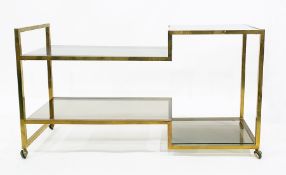LOT WITHDRAWN Contemporary brass-framed and smoky glass four-wheeled serving/display table