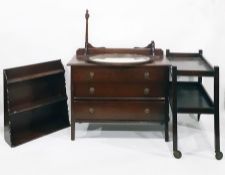 Stained oak chest of three long drawers, a two-tier oak tea trolley, a three-shelf wall rack and