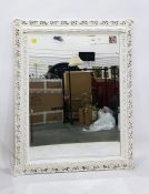 Large rectangular bevelled plate overmantel mirror within a white moulded and pierced acanthus