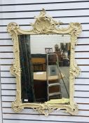 Cream painted acanthus moulded framed wall mirror and a mirrored door (2) the size is 97 cms x 69