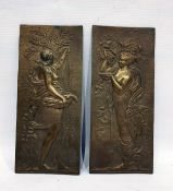 Pair of brass relief moulded rectangular door/wall plates in the Art Nouveau style, depicting