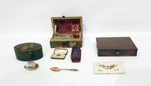 Lacquer box of oval form, the cover decorated with pears and contents of buttons, a late 18th/