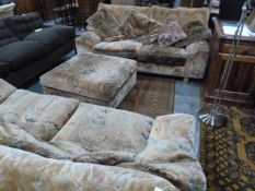 Attributed to Howard Keith 1970's pair of two-seater sofas and square pouffe in plain stitched