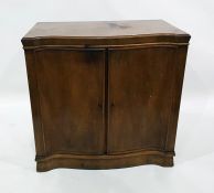 20th century walnut serpentine-fronted two-door cupboard enclosing drawers