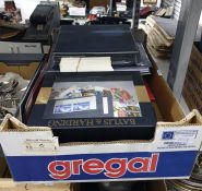 Two boxes of assorted loose stamps, First Day Covers, albums, etc