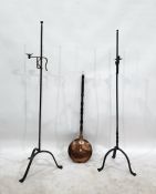 Pair of wrought iron adjustable floor lights with tripod bases and a copper warming pan (3)