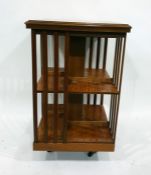 Edwardian inlaid mahogany revolving bookcase, square, the top inlaid with circular fan pattera and