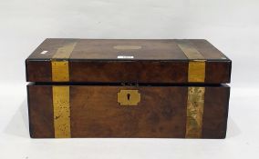 Victorian walnut writing box of rectangular form with brass inlaid straps, the fitted interior