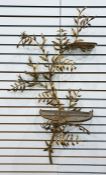 Gilt metal wall bracket in the form of foliate branch with three demi-lune graduated trellis shelves