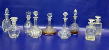 Quantity of cut glass decanters including ship's decanter (9)