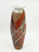 20th century studio stoneware vase with everted rim, elongated ovoid body, with grey, red and