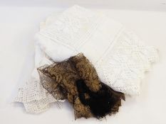 Assorted table linen including crocheted, embroidered, damask, etc (1 bag)