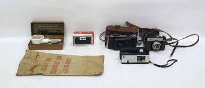 Ensign folding camera, Canon Smenahm camera, a further camera, Magniray folding opera glass and a