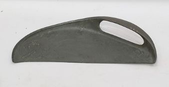 Liberty & Co pewter crumb scoop by Archibald Knox of oval form with pierced handle, having raised