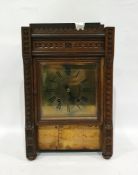 Late 19th century carved oak case mantel clock with square brass dial with roman numerals,