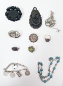 Silver brooch, turquoise set silver-coloured metal bracelet, carved jet type pendant with floral