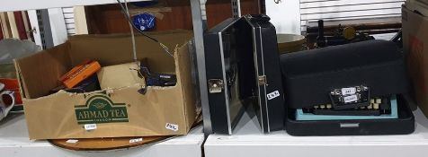 Scheidegger 'Typomatic' TMS portable typewriter in black carry case, a black picnic cocktail case