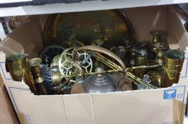 Quantity of brass and copperware including trivets, two shell cases, candlesticks, fire irons, a