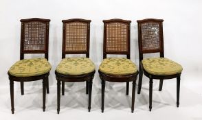 Set of six French style mahogany and kingwood inlaid, caned back dining chairs, having cross-