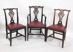 Four early 20th century mahogany dining chairs (3+1) in the Georgian style with pierced and shaped
