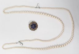 LOT WITHDRAWN 9ct gold brooch pendant set with central flowerhead of seven amethysts within a