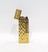 Dunhill gold-coloured bark-effect metal and burgundy enamel lighter, impressed marks to base, US