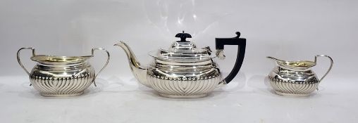 Silver three-piece tea set by Henry Matthews, Birmingham 1927, comprising teapot, two-handled