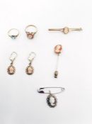9ct gold bar brooch set with a central carved shell cameo of a lady in profile, a gold and shell